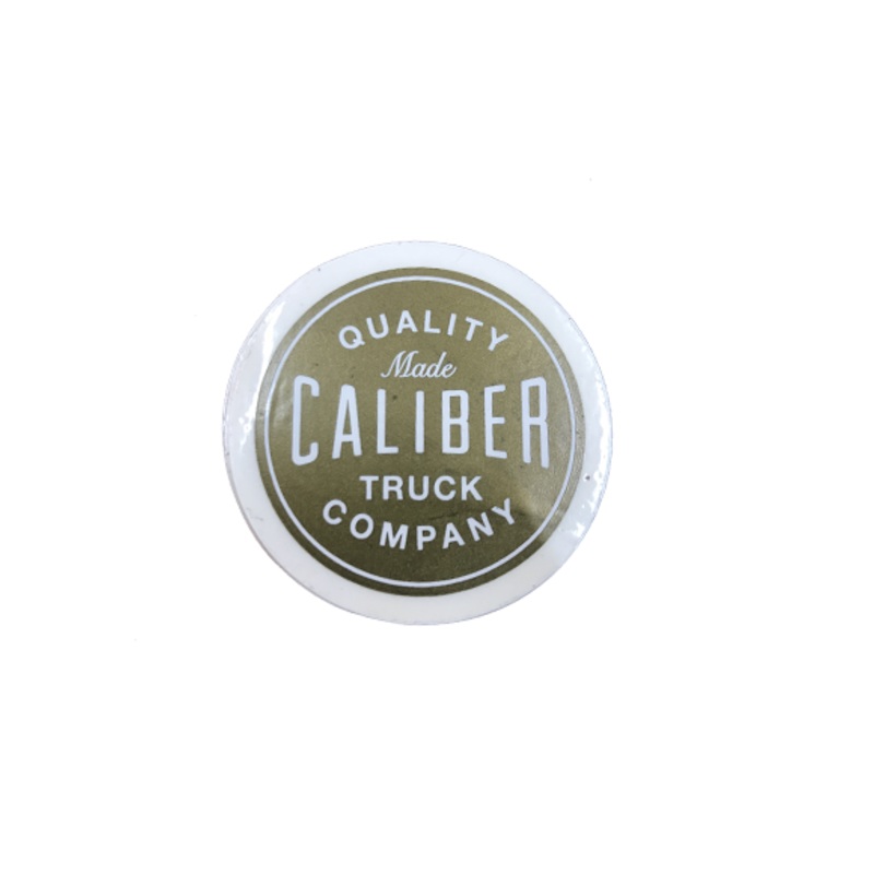 Caliber Button Sticker Gold